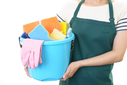 Carpet cleaning team preparing equipment with safety checks in place