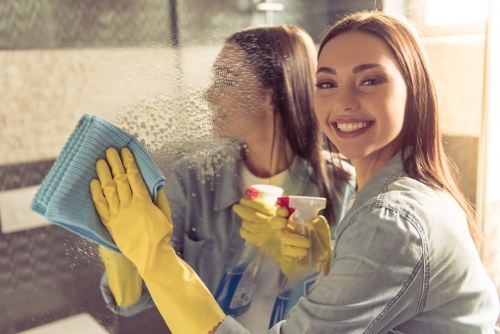 Local cleaner preparing an Airbnb flat in Acton for new guests